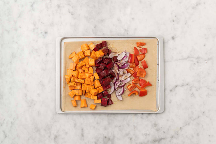 Bag kartofler og grøntsager