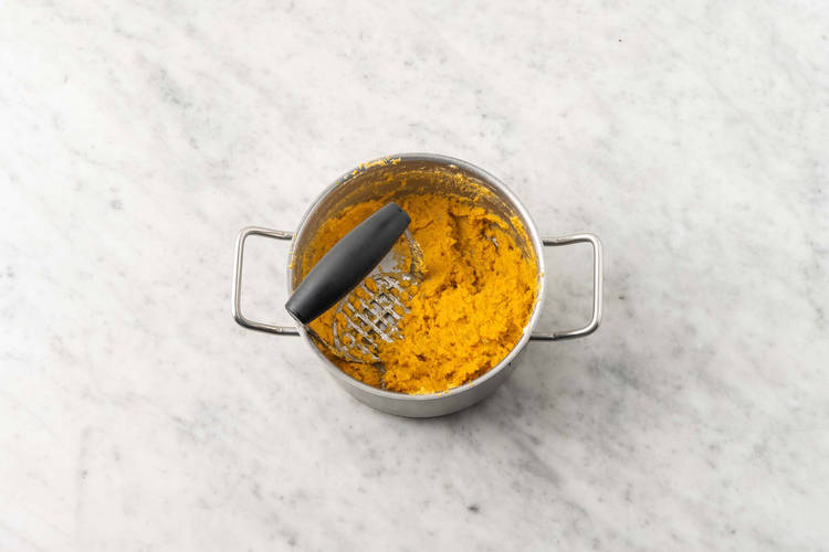 Boil water and cook squash