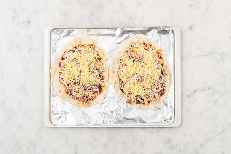 Assemble and bake pizzas