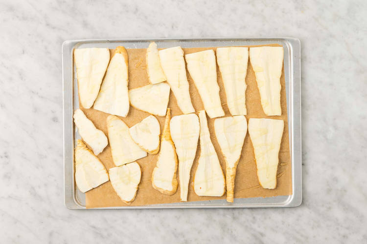 Bag kartofler og pastinak