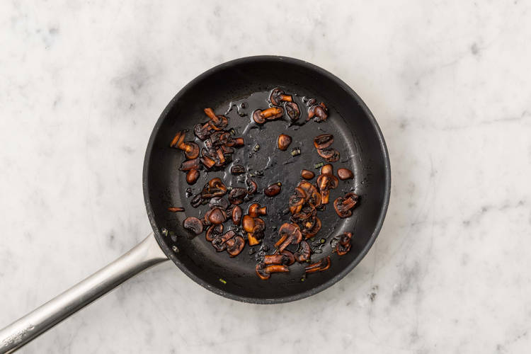 Cook mushrooms and sauce