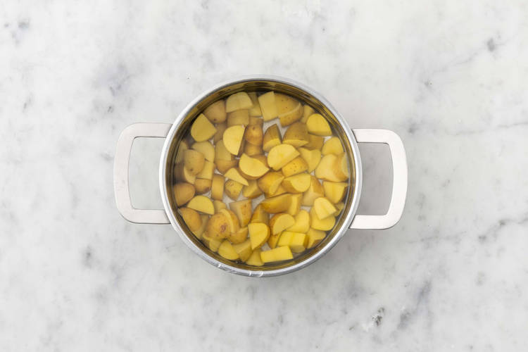 Prep veggies and start potatoes