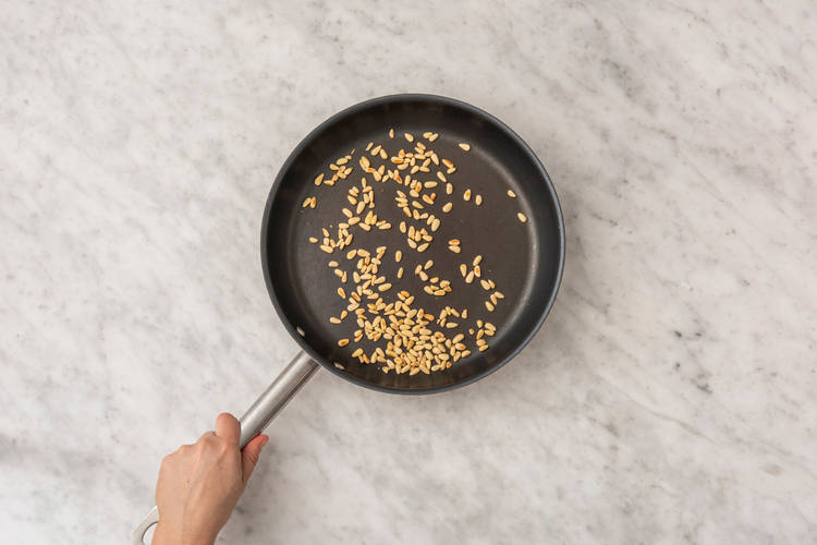 Toast pine nuts