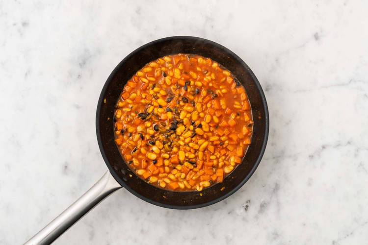 Faire cuire les haricots et les légumes