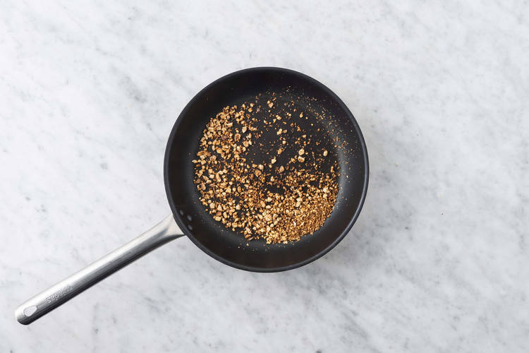 Toast walnuts and make crumb