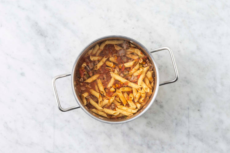 Cook penne and season ricotta