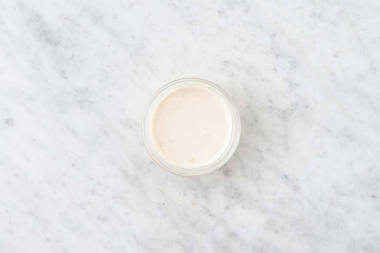 Make tahini sauce and warm naan