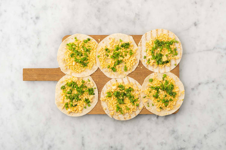 Assemble and cook quesadillas