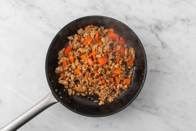 Cook turkey and peppers