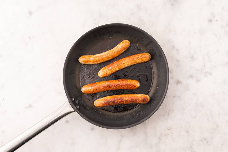 Cuire les merguez de poulet