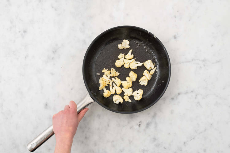 Cook cauliflower