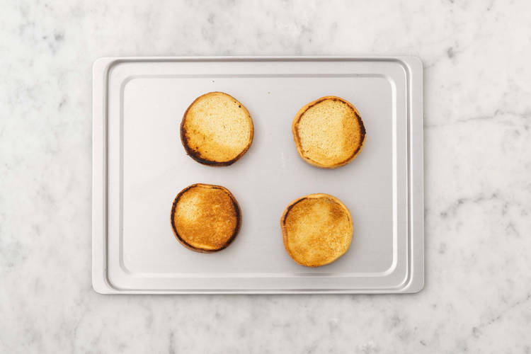 Toast buns and prep dressing