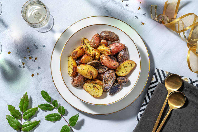 Aardappelblokjes met geraspte gruyère 