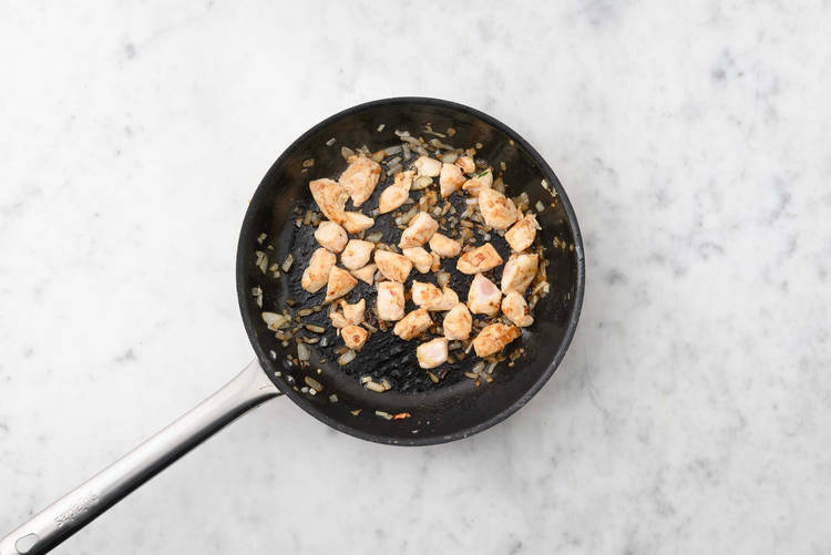 Cook chicken and onions