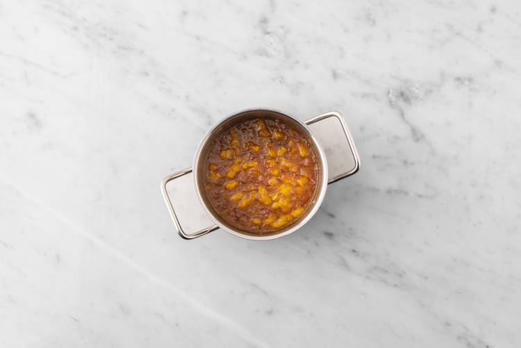 Cook orange-apricot sauce