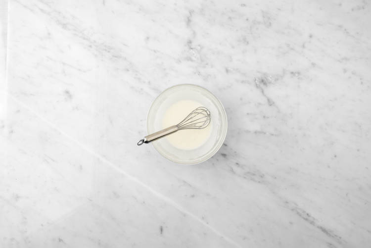 Cool cake and make lemon glaze