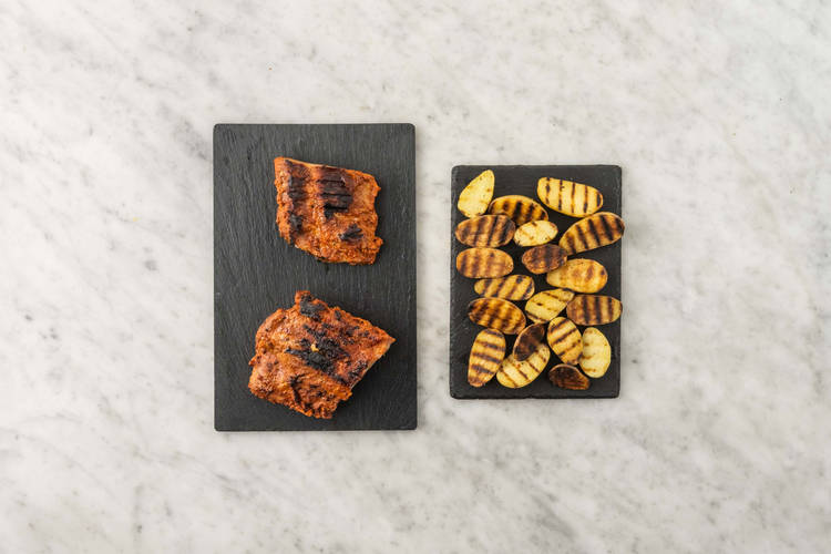 Grill potatoes and ribs