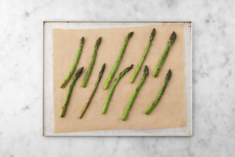 Cook asparagus and steak