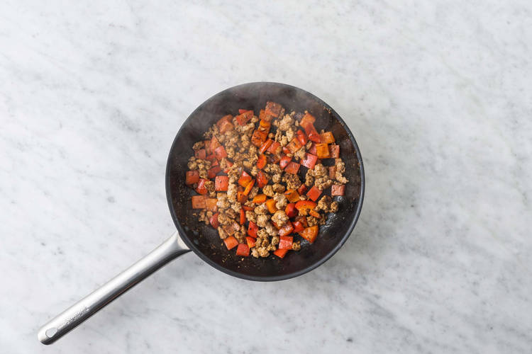 Cuire la dinde et les poivrons