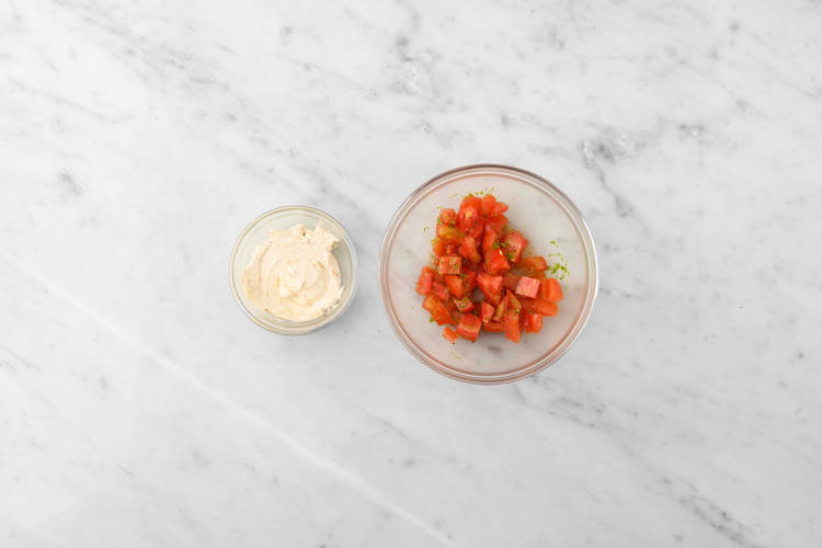 Make spiced sour cream and marinate tomatoes