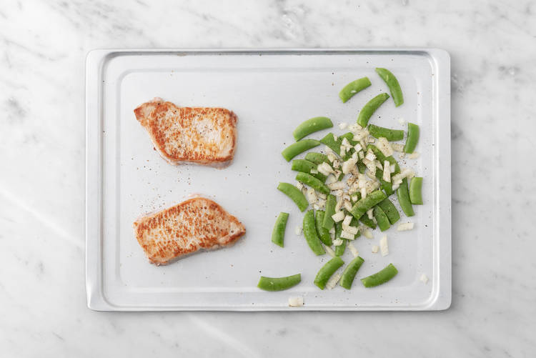 Cook pork and veggies