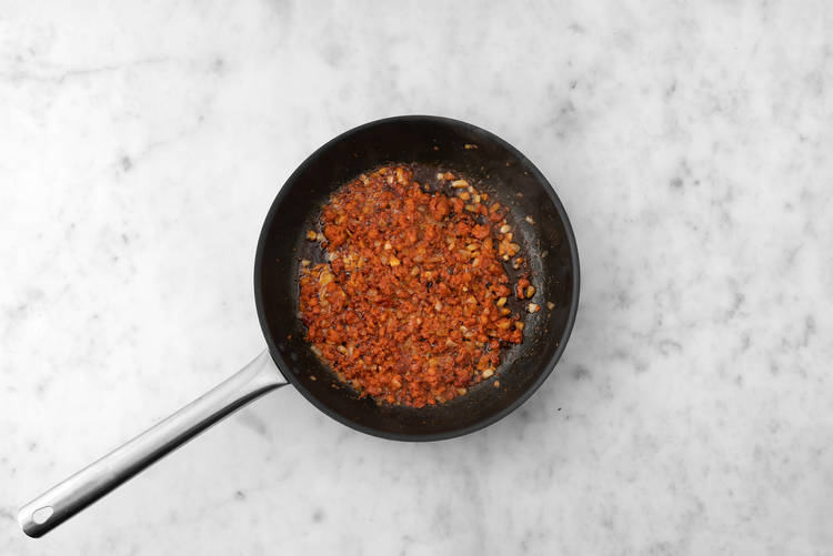 Cook chorizo and veggies