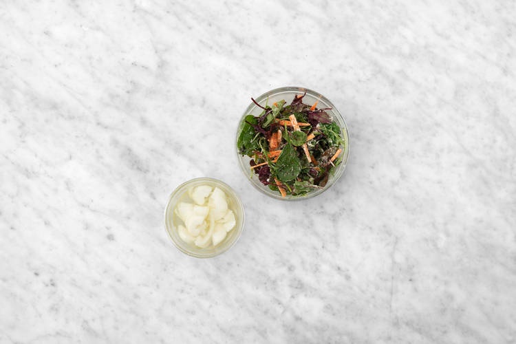 Pickle onions and mix salad