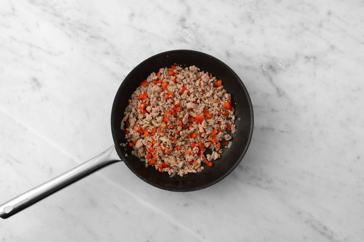 Cook pork and veggies