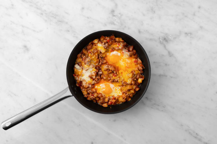 Cook potatoes and bake skillet