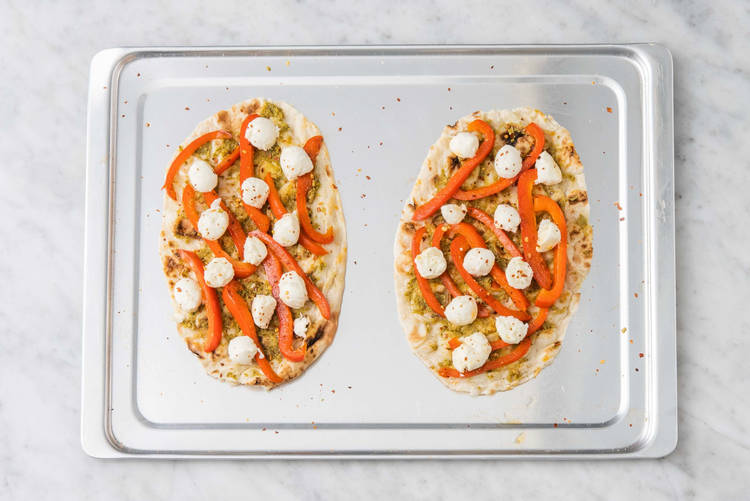 Assemble and toast pizzas