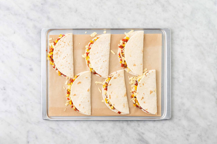 Enfourner les quesadillas