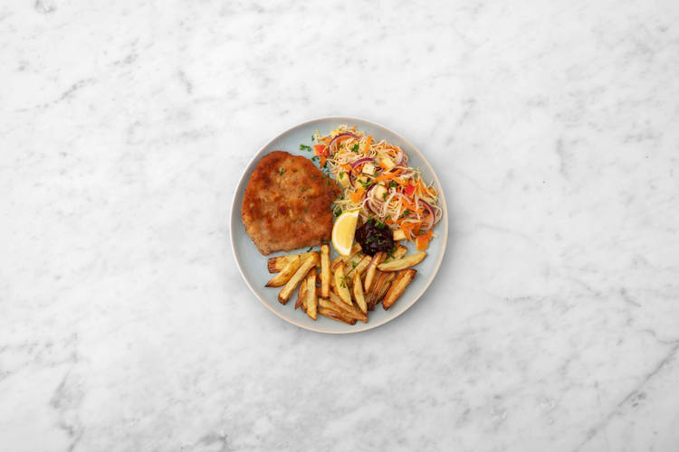 Cuire l'escalope panée et servir