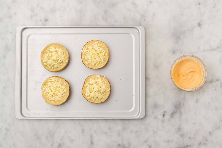 Toast buns and make spicy crema