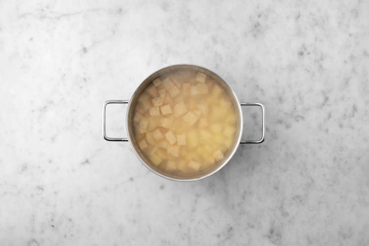 Cook potatoes and celeriac