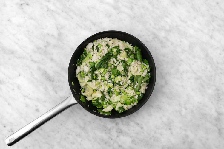 Cook veggies and finish rice