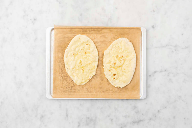Badigeonner les naans
