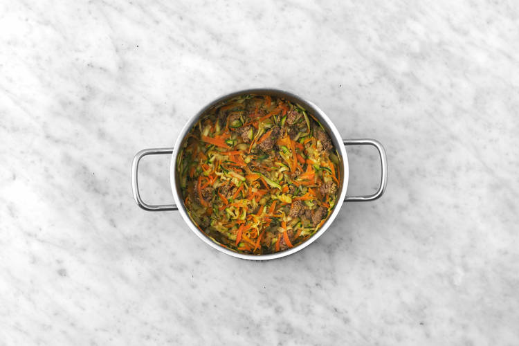 Cook meat and veggies