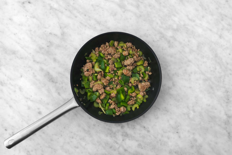 Cook pork and veggies