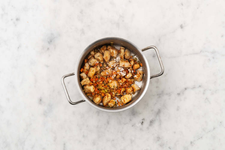 Cook chicken and veggies