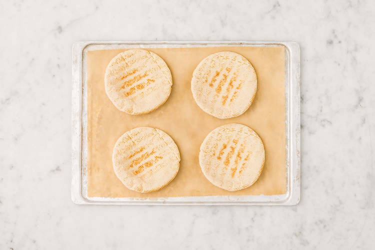 Enfourner les pains pita