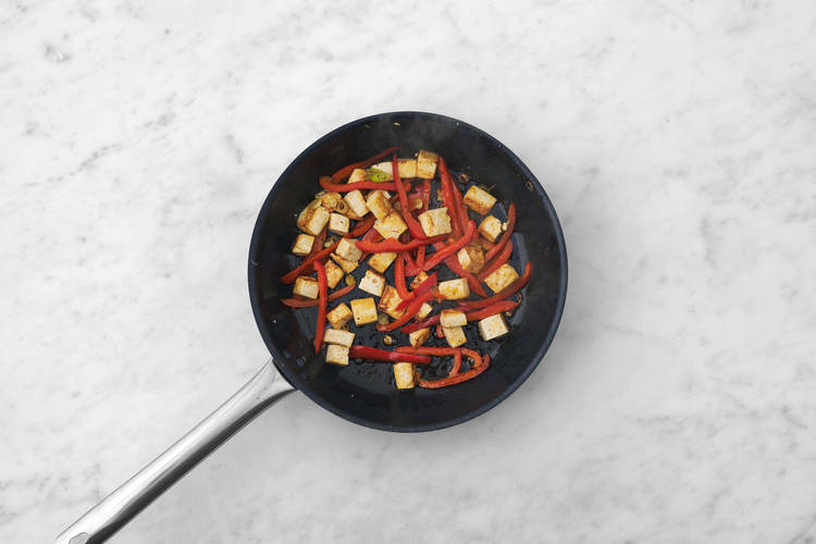 Cuocere tofu e peperoni