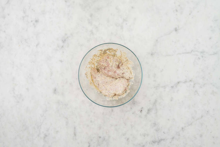 Boil water and marinate tofu