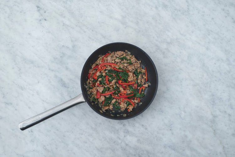 Cook sausage and veggies