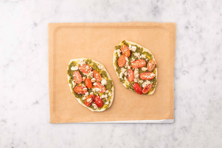 Cook chicken and assemble flatbreads