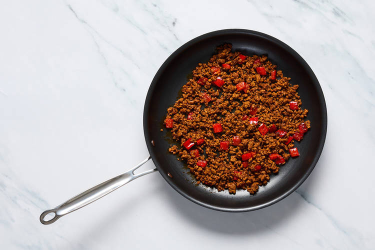 Cook chorizo and shallots