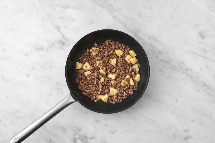 Cook beef and pork mix