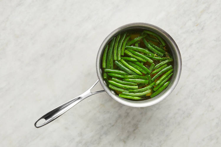 Boil potatoes and green beans