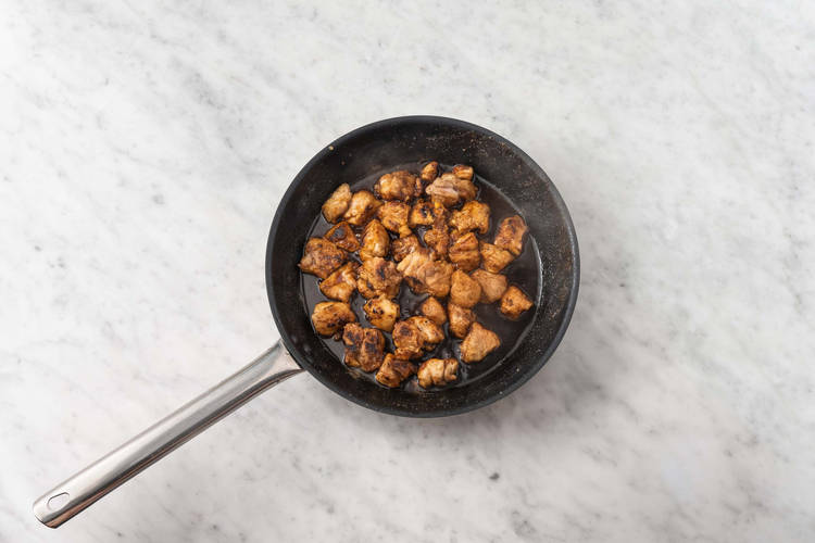 Cook chicken and sauce