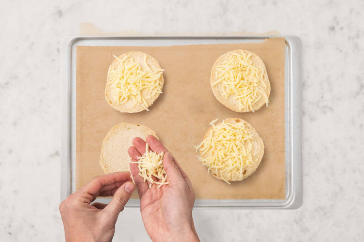 Toast buns and assemble melts