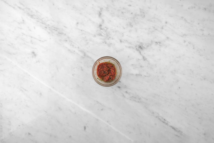 Bake calzones and heat marinara 